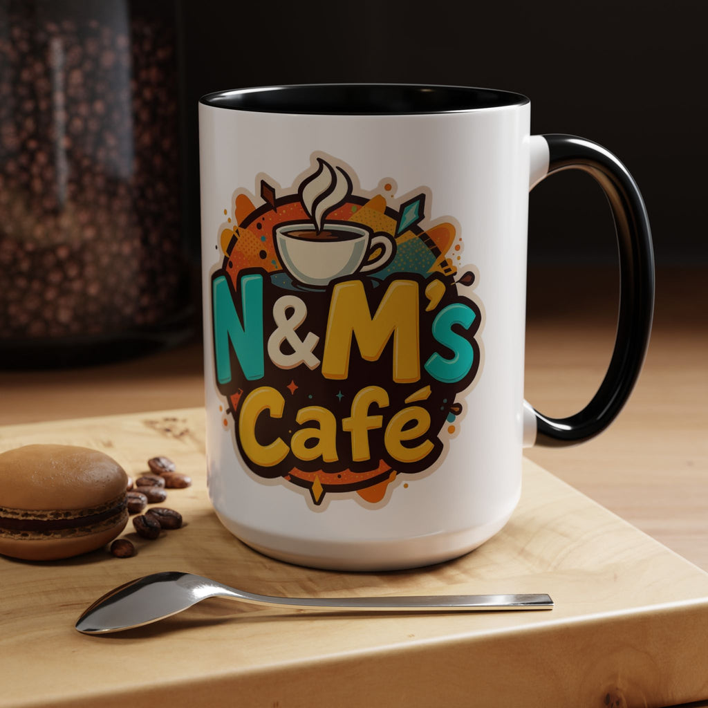 Ceramic Coffee Mug with N&M's Café logo, complemented by a cozy atmosphere with coffee beans and a spoon.