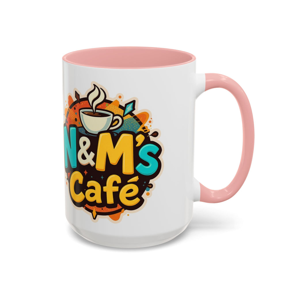 Ceramic Coffee Mug with N&M's Café design, featuring a pink handle and interior, great for brightening up your coffee experience.